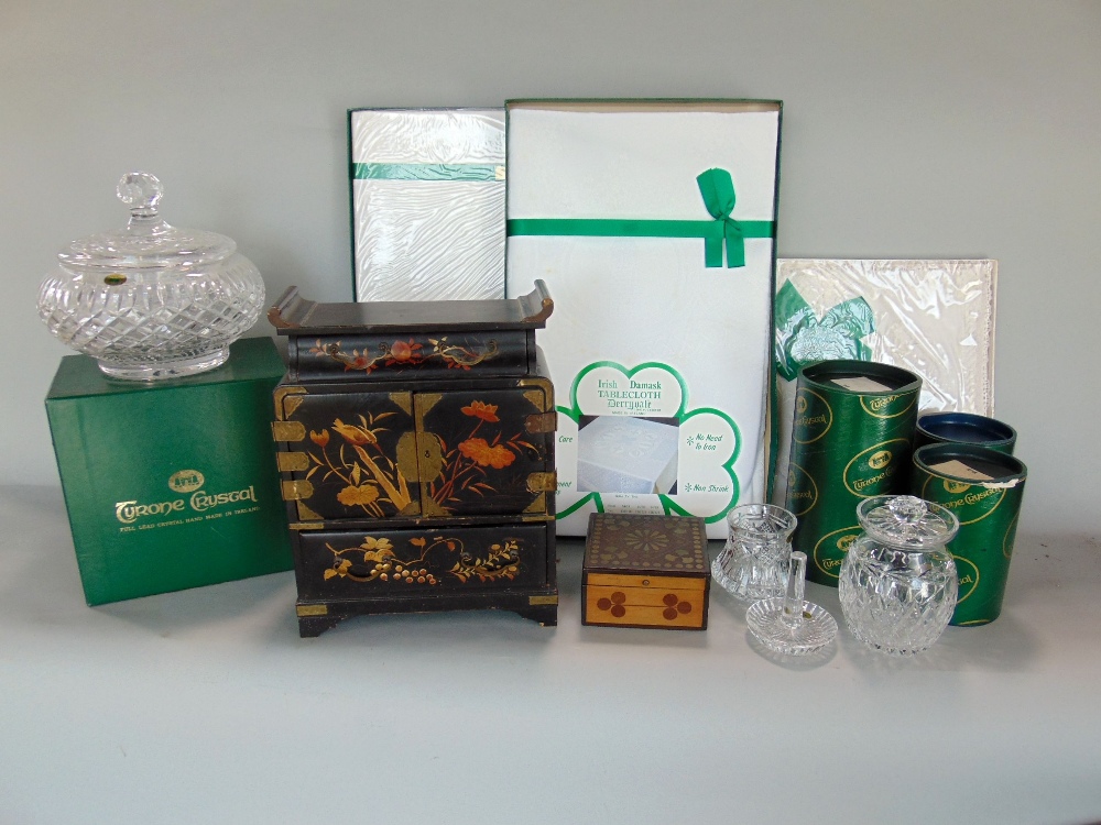A collection of Tyrone crystal including The Coleraine Jar, The Slemish Holder, a table cloth 63 x