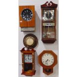 A collection of five various vintage wall clocks to include a 31 day clock with day/date aperture, a
