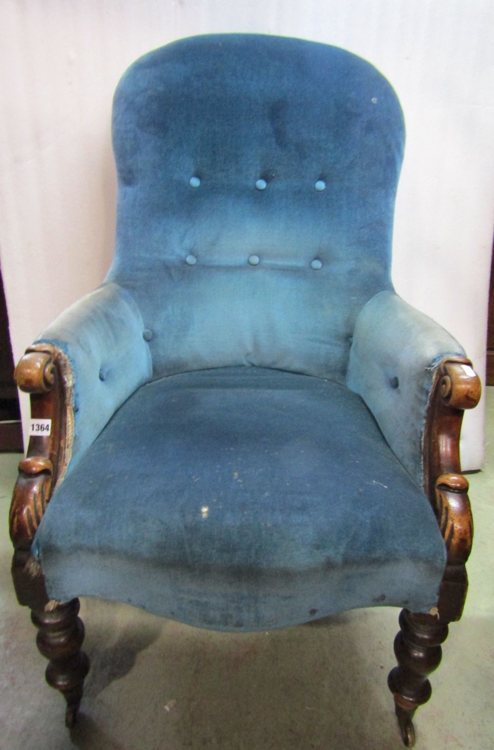 A Georgian mahogany armchair with pierced splat, scrolled arms, upholstered seat on shaped