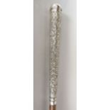 Victorian parasol with embossed Indian silver handle with scrolling and other detail