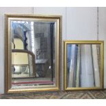 Five contemporary wall mirrors of varying size and design, all with gilt moulded frames, four