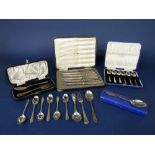 A mixed collection of silver flatware to include a cased set of six teaspoons, a cased fork and