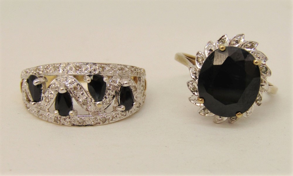 Two 9ct blue spinel and diamond dress rings to include a stylised example set with pear cut