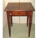 A small antique oak side table, fitted with a frieze drawer raised on square tapered supports,