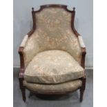 A good quality continental drawing room chair, with floral patterned upholstery and loose feather