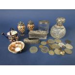A mixed lot comprising a silver lidded cut glass scent jar, two further silver lidded glass jars,