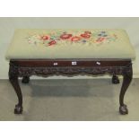 An Edwardian mahogany stool of rectangular form in the Georgian style, with associated floral
