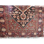 Persian Heriz village rug, dark navy ground, 260 x 160cm