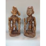 Two carved Benin type carved wooden tribal figures