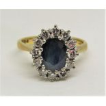 18ct sapphire and diamond oval cluster ring, size M, 5.5g