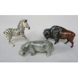 A collection of three Beswick animals comprising a zebra with circular printed mark to base, a bison