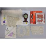 Mixed collection of textiles including vintage embroidered table linen, white table cloths, a