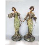 Pair of French cast spelter figures of society ladies with polychrome detail, signed L. Alliot, each