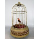 German Automaton singing bird in cage, 25cm high (af)