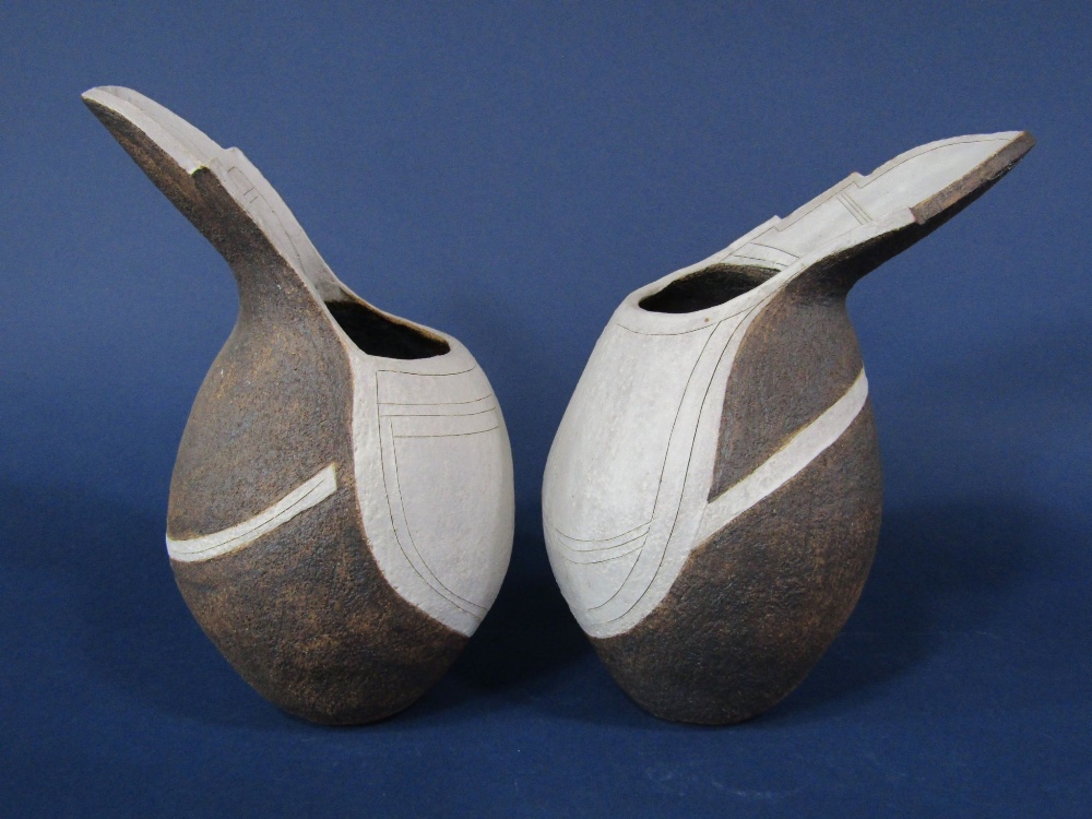 A matched pair of contemporary Studio Pottery vases with textured brown and grey glazed finish,