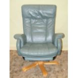 A pair of Stressless style adjustable armchairs upholstered in a pale green leather on swept