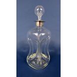 Edwardian silver collared waisted glass decanter, the collar maker MC Birmingham 1907, 31 cm high (