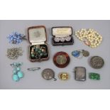 Mixed lot of costume jewellery to include an oval citrine brooch stamped '9ct', silver vesta, 800