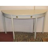 A painted timber D end side/hall table enclosing a single frieze drawer raised on four square