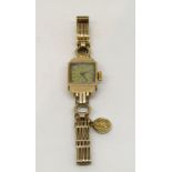 Ladies automatic 9ct cocktail watch in the art deco manner, with Dennison case and gate link