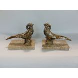 A pair of gilt cast metal golden pheasants upon marble bases, 19 cm long