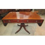 A Georgian mahogany sofa table, with inlaid crossbanded detail, fitted with two real and two dummy