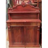 A Victorian mahogany chiffonier, the raised arched and panelled back with acanthus detail over a
