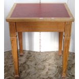 A light oak library or office table of rectangular form, with inset faux leather writing surface