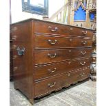 A substantial Georgian mahogany secretaire chest, the front elevation enclosed by four long drawers,