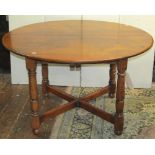 Batheaston Chair Makers Ltd - an oak draw-leaf dining table