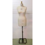 A Kennett & Lindsel Ltd tailors dummy, female torso, raised on an adjustable metal stand