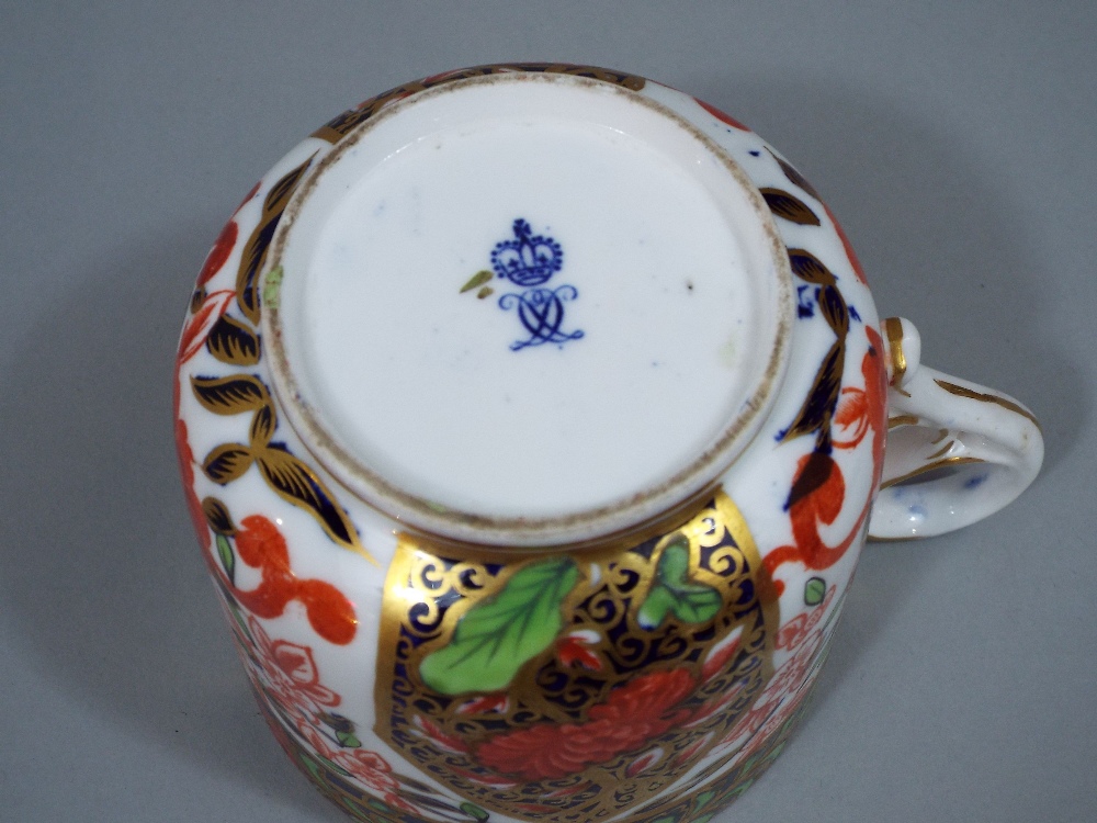 Crown Derby Imari moustache cup and saucer, with panels painted with birds and typical gilt - Image 4 of 4