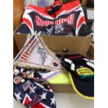 A collection of speedway memorabilia including Swindon speedway pennants, two caps, one signed and