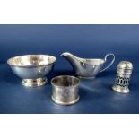 A mixed collection of silver to include a 1920s silver pedestal bowl, further silver cream jug,