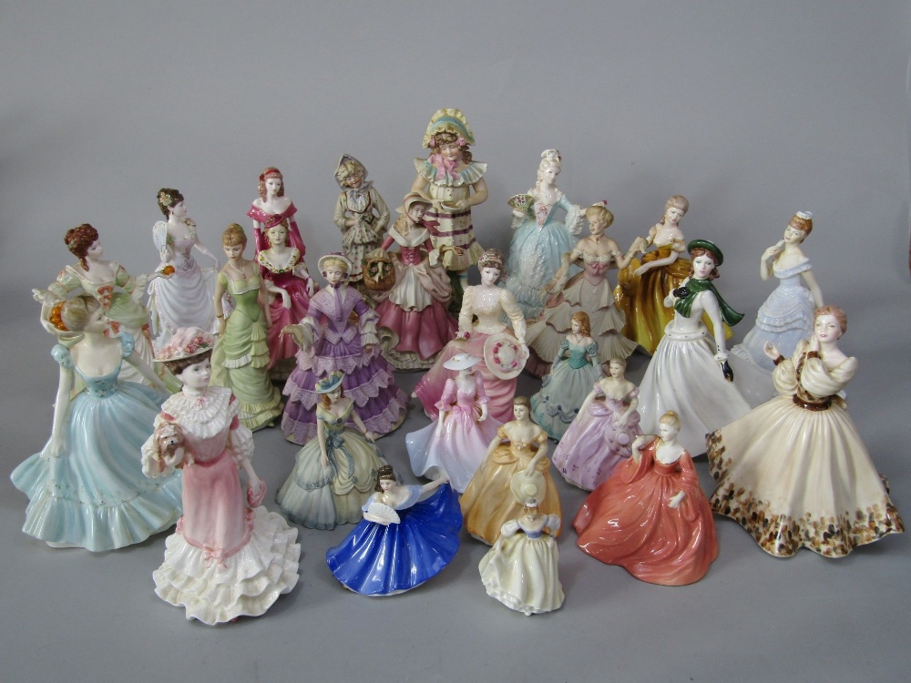 A collection of mainly Coalport figures of ladies including Nell Gwynn and Marie Antoinette from the