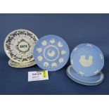 An extensive collection of 58 Wedgwood blue ground Jasperware collectors Christmas plates,