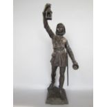 French cast bronze study of a standing gentlemen wearing a hooded jacket, holding a lantern and