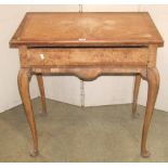 A good quality Georgian style walnut veneered side table, the rectangular top with feather banding