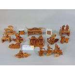 Collection of hand made wooden traditional toys including puzzle boxes and articulating figures