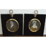 A collection of four miniature portraits comprising a matched pair, probably husband and wife both