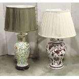 An Italian white glazed and hand painted ceramic table lamp in the form of a baluster shaped vase