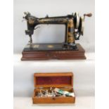 A sewing machine by Wheeler Wilson of Bridgeport Connecticut circa 1892 number 2749985 together with