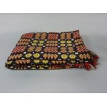 Good quality woollen Welsh blanket, double weave in shades of orange, black, yellow and white,