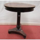 A William IV rosewood occasional table of circular form raised on a central turned pillar, shaped