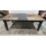 A Victorian oak wind out extending dining table of rectangular form, with single additional leaf,