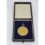 George IV double sovereign dated 1825, within 9ct pendant mount, 18.5g