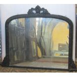 A 19th century arched overmantle mirror with moulded detail and later painted finish, 115 cm wide