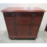 A Victorian pine bedroom chest of two short over three long graduated drawers, raised on turned