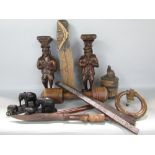 A box containing a collection of carved treenware to include various Black Forest type figures and