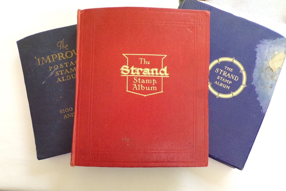 Two Strand and an Improved postage stamp albums containing GB and World stamps